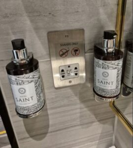 Close-up of premium toiletries on a bathroom countertop.