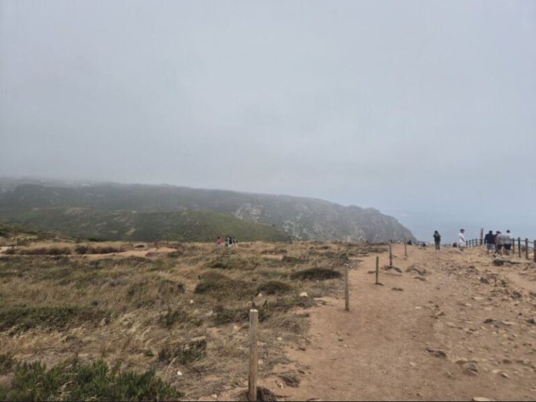 🌊 Seaside Experience: Cascais & Cabo da Roca Day Trip Highlights (2025) 10 Foggy landscape with cliffs and path