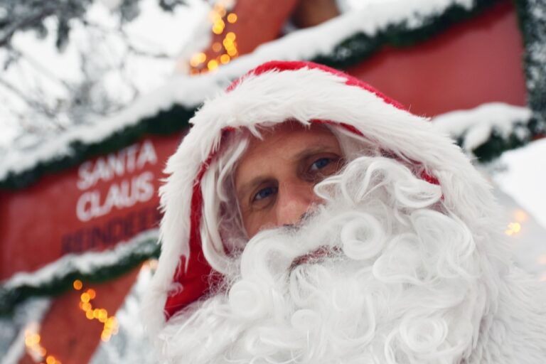 Magical Christmas vacation in Lapland Finland with Santa Claus in a festive snowy setting. Merry Christmas!
