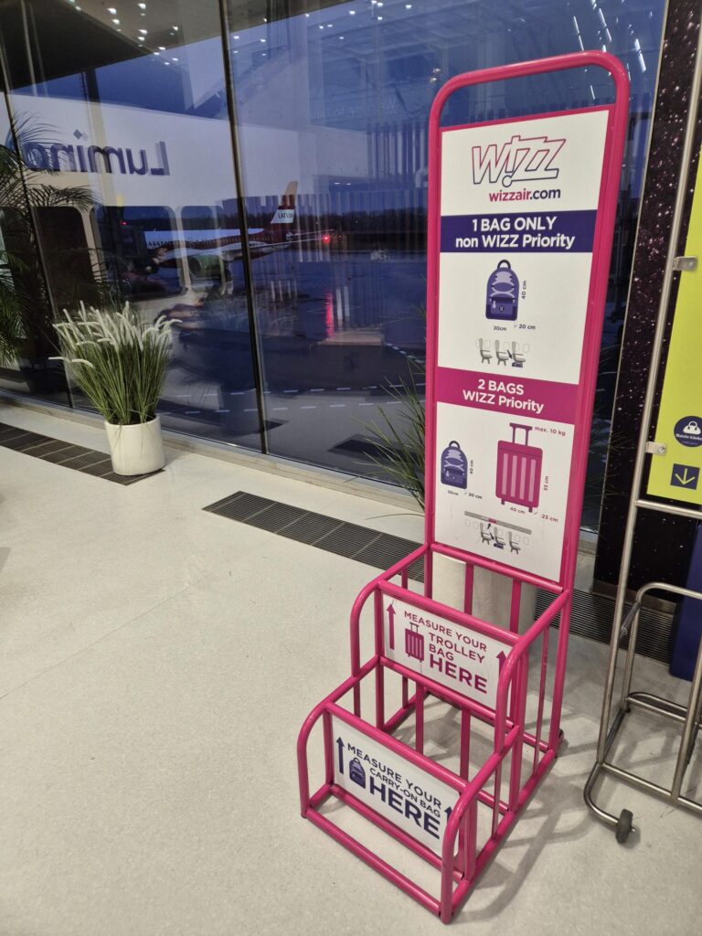 Wizz Air baggage sizer frame used to check cabin and personal bag dimensions before boarding.