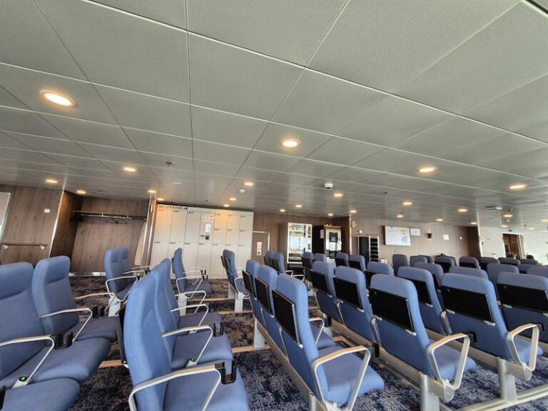 Horizon Seats lounge with luggage storage and vending machine.